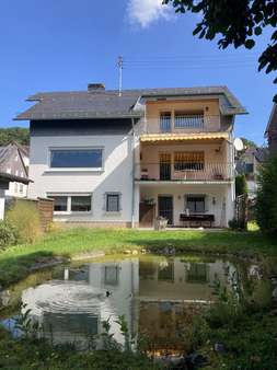 Einfamilienhaus mit Gartenteich - Einfamilienhaus in 57234 Wilnsdorf mit 155m² kaufen