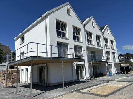 Ansicht Rückseite - Erdgeschosswohnung in 57399 Kirchhundem mit 122m² kaufen