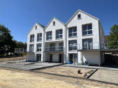 Ansicht Rückseite - Erdgeschosswohnung in 57399 Kirchhundem mit 119m² kaufen