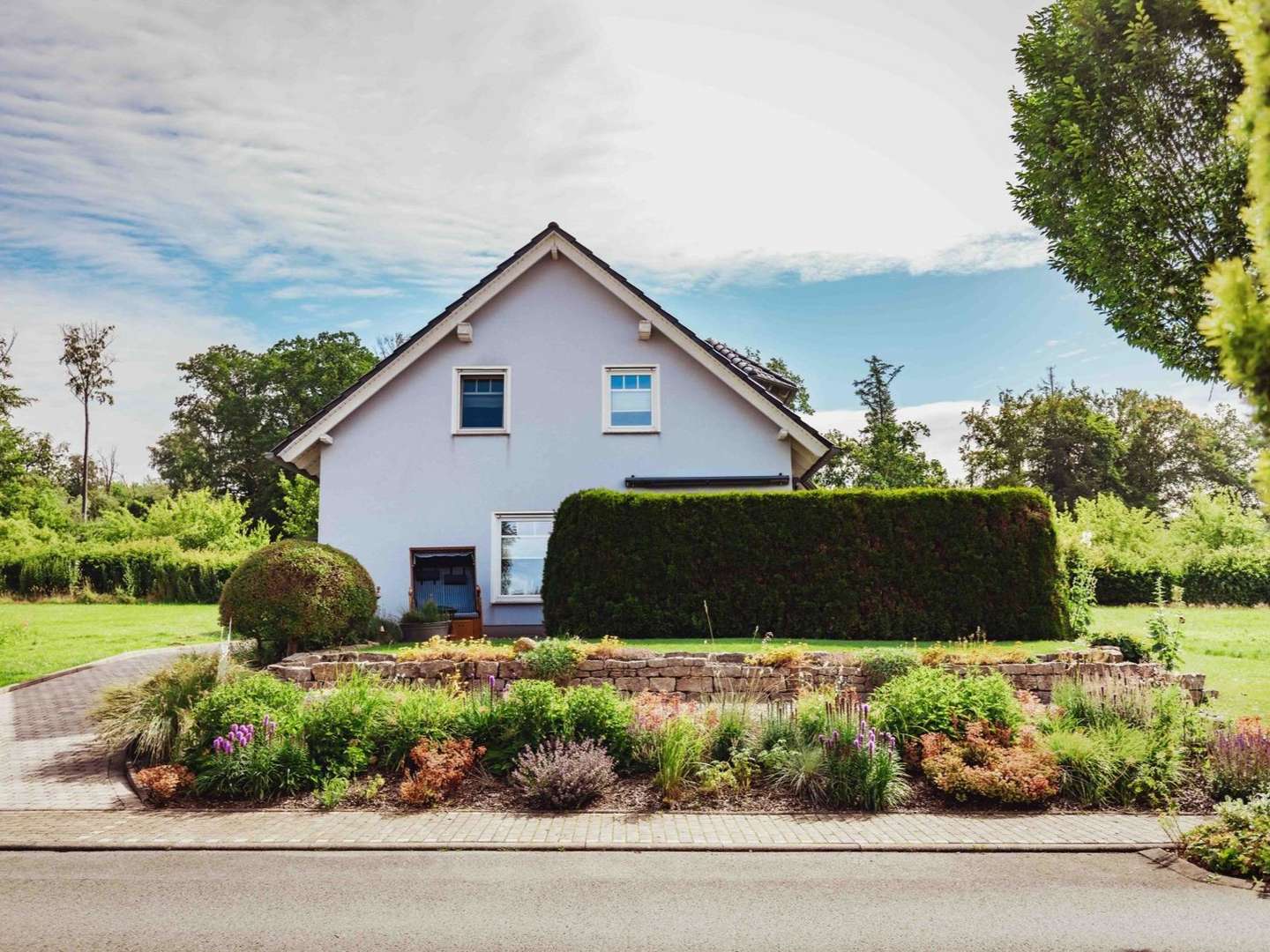 Straßenansicht - Einfamilienhaus in 34434 Borgentreich / Bühne mit 140m² kaufen