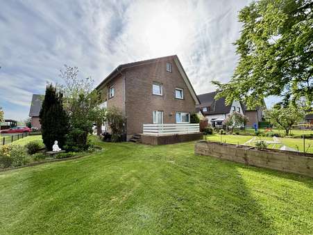 seitl. Rückansicht - Einfamilienhaus in 33129 Delbrück / Westenholz mit 145m² kaufen