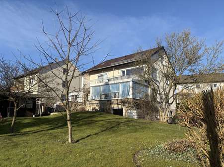 Gartenansicht - Zweifamilienhaus in 32760 Detmold / Spork-Eichholz mit 165m² kaufen