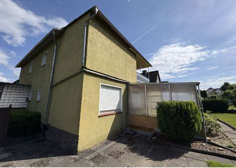 Seitenansicht - Einfamilienhaus in 37688 Beverungen mit 175m² kaufen