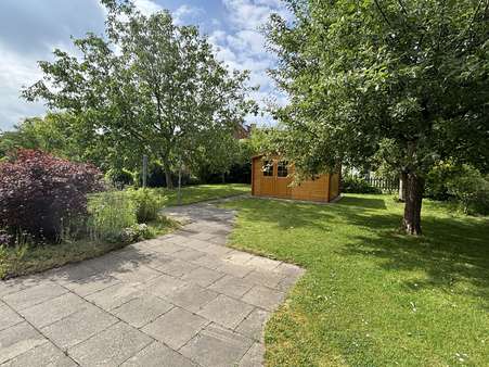 Gartenansicht Gartenansicht - Zweifamilienhaus in 32791 Lage mit 186m² kaufen