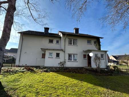 Straßenansicht Straßenansicht - Doppelhaushälfte in 34414 Warburg / Wormeln mit 95m² kaufen