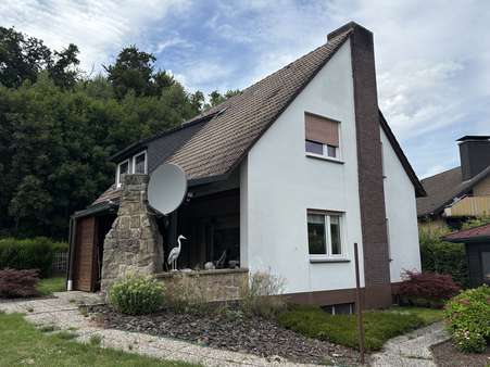 Seitenansicht - Einfamilienhaus in 32791 Lage mit 123m² kaufen