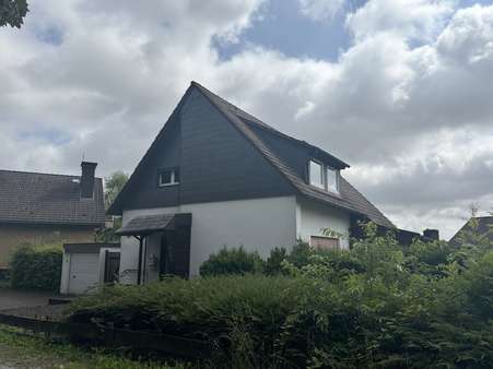Straßenansicht - Einfamilienhaus in 32791 Lage mit 123m² kaufen