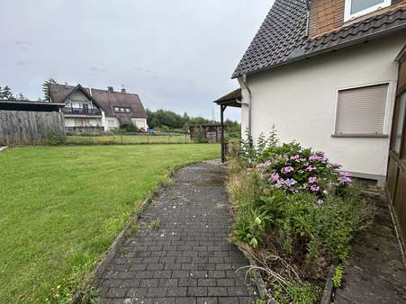Rückansicht Rückansicht - Zweifamilienhaus in 32805 Horn-Bad Meinberg mit 134m² kaufen