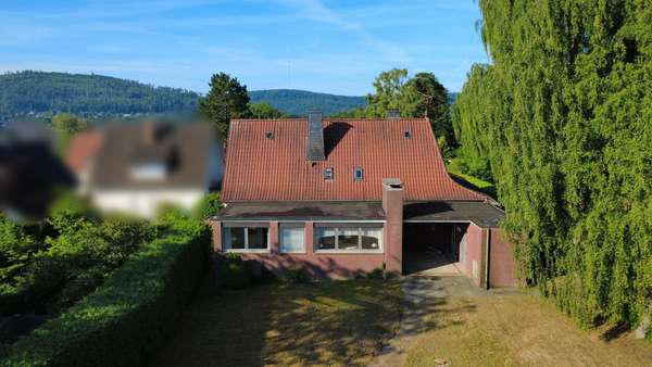 Gartenansicht - Zweifamilienhaus in 32760 Detmold / Hiddesen mit 214m² kaufen