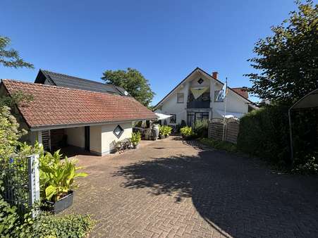 Außenansicht Außenansicht - Mehrfamilienhaus in 33178 Borchen / Kirchborchen mit 220m² kaufen