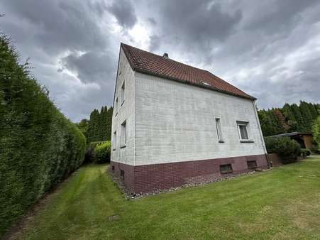 Seitenansicht - Einfamilienhaus in 32825 Blomberg mit 100m² kaufen