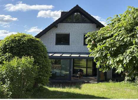 Rückansicht Rückansicht - Einfamilienhaus in 33034 Brakel mit 143m² kaufen