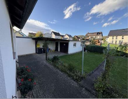 Gartenansicht - Doppelhaushälfte in 37671 Höxter / Ottbergen mit 127m² kaufen
