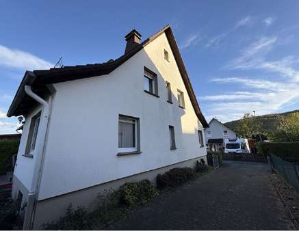 Seitenansicht - Doppelhaushälfte in 37671 Höxter / Ottbergen mit 127m² kaufen