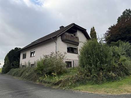 Seitenansicht - Einfamilienhaus in 33039 Nieheim / Kariensiek mit 108m² kaufen
