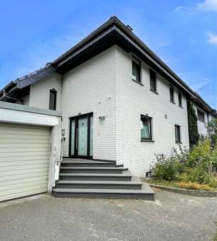Eingangsansicht Eingangsansicht - Einfamilienhaus in 33397 Rietberg mit 150m² kaufen