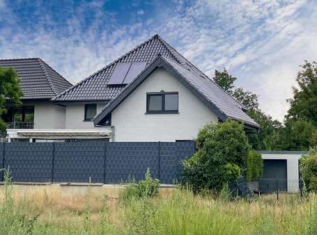 Rückansicht Rückansicht - Einfamilienhaus in 33397 Rietberg mit 150m² kaufen
