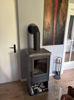 Wohnzimmer im EG mit Kamin Wohnzimmer im EG mit Kamin - Einfamilienhaus in 33330 Gütersloh mit 140m² kaufen