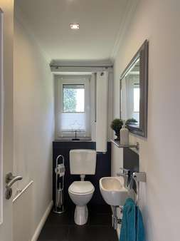 Gäste-WC im Erdgeschoss - Doppelhaushälfte in 33442 Herzebrock-Clarholz mit 160m² kaufen