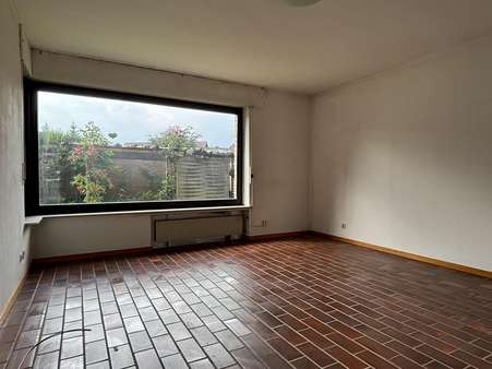 Wohnzimmer - Einfamilienhaus in 33803 Steinhagen mit 184m² kaufen