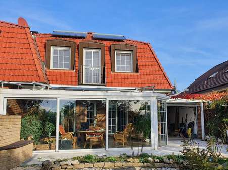 Gartenansicht - Doppelhaushälfte in 32289 Rödinghausen mit 148m² günstig kaufen