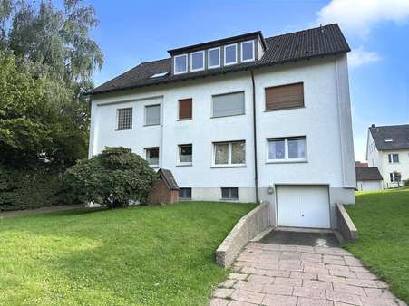 Rückseite des Hauses - Erdgeschosswohnung in 33617 Bielefeld mit 104m² kaufen