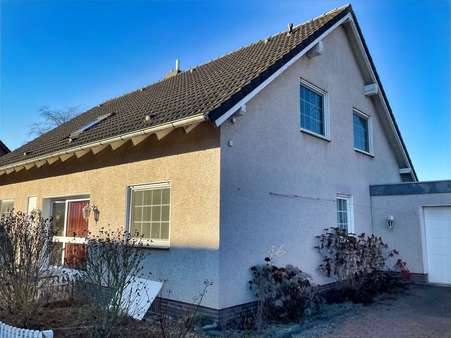 Eingangsbereich und Garage - Einfamilienhaus in 33790 Halle mit 164m² günstig kaufen