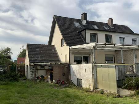 Gartenansicht - Doppelhaushälfte in 33605 Bielefeld mit 100m² kaufen