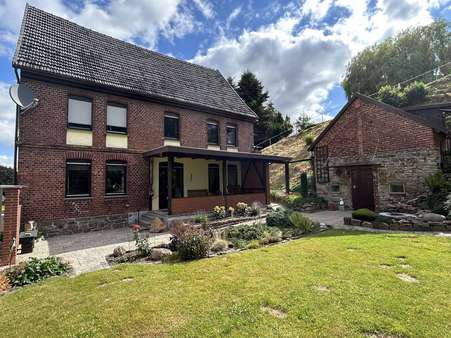 Gartenansicht - Einfamilienhaus in 32694 Dörentrup mit 150m² kaufen