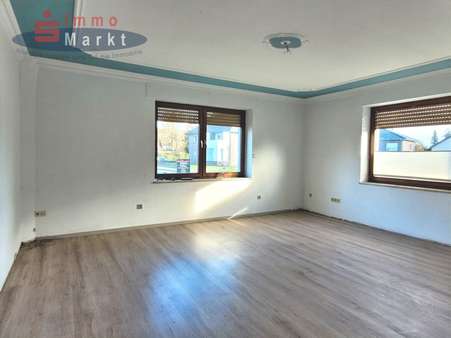 Wohnzimmer EG - Mehrfamilienhaus in 32351 Stemwede mit 237m² günstig kaufen