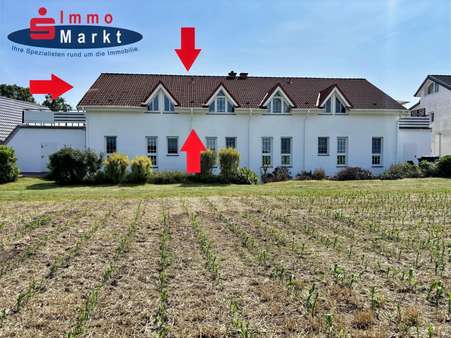 Nordansicht Nordansicht - Dachgeschosswohnung in 32479 Hille mit 81m² kaufen