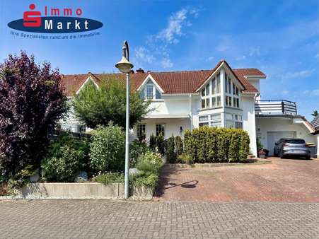 Straßenansicht Straßenansicht - Dachgeschosswohnung in 32479 Hille mit 81m² kaufen