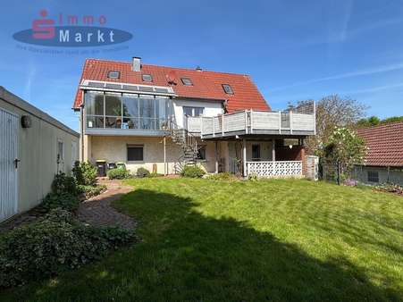 Gartenansicht - Zweifamilienhaus in 32609 Hüllhorst mit 273m² kaufen