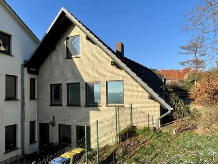 Seitliche Gartenansicht - Einfamilienhaus in 32457 Porta Westfalica mit 152m² kaufen