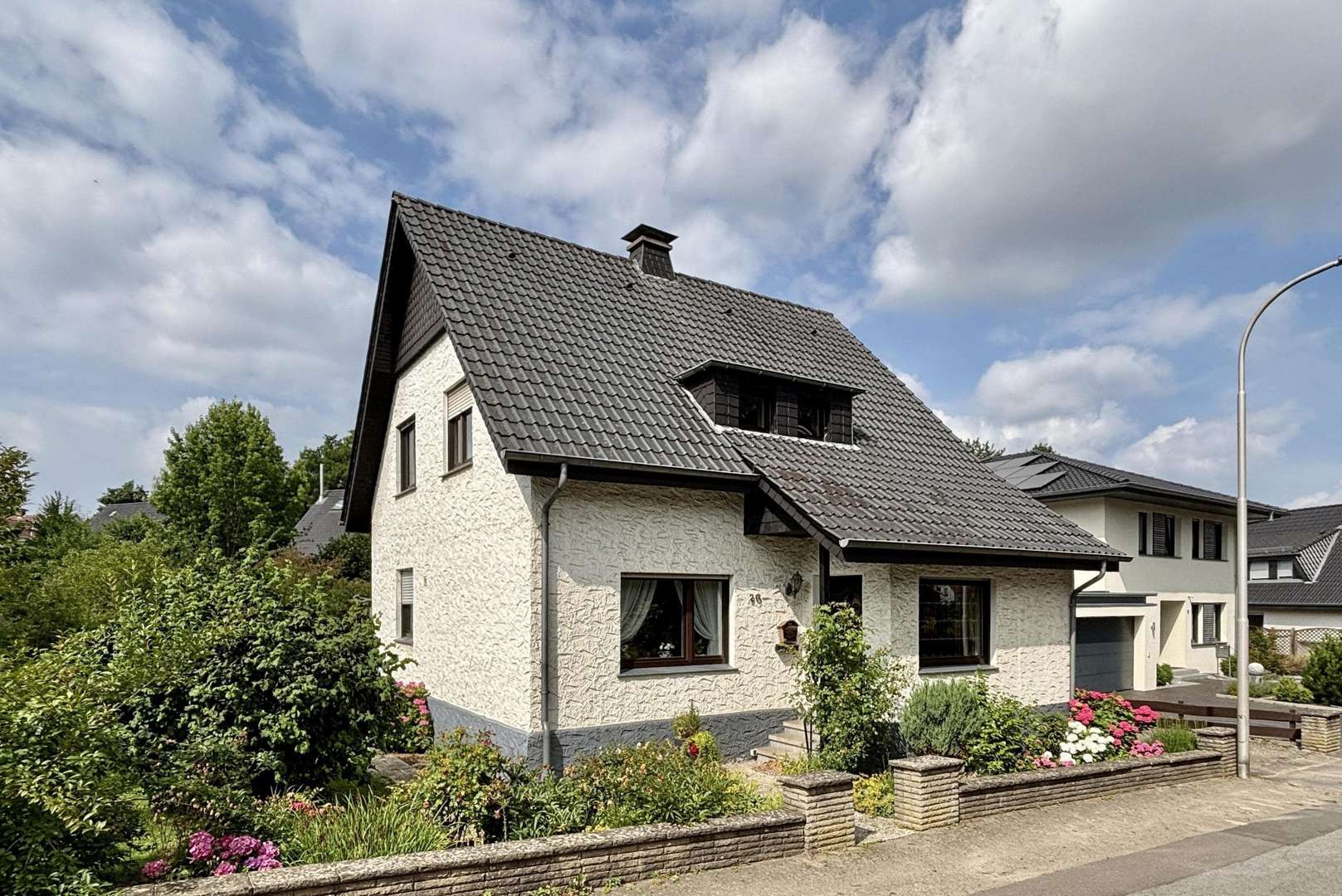 Außen Außen - Einfamilienhaus in 32584 Löhne mit 115m² kaufen