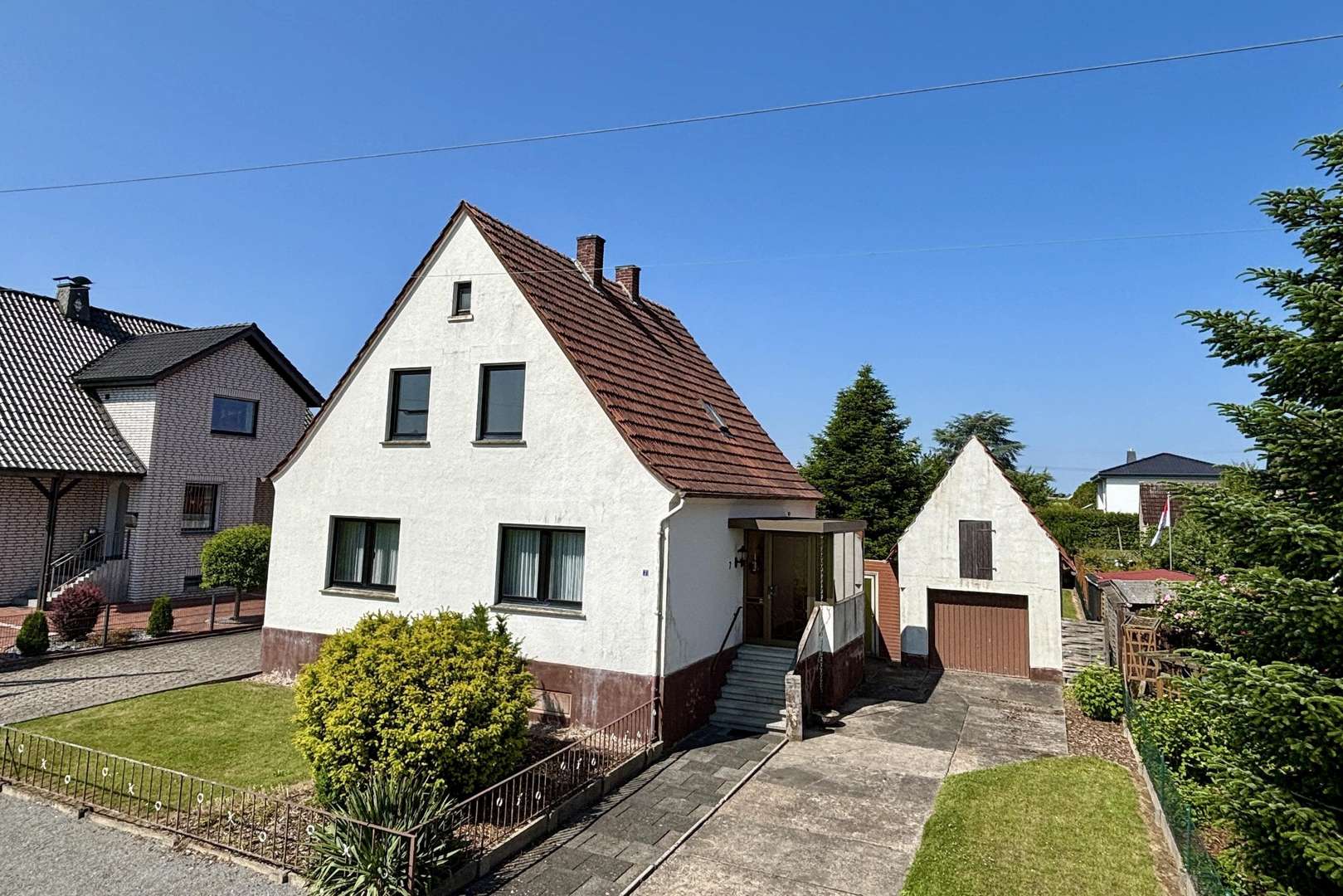Außen 1 - Einfamilienhaus in 32584 Löhne mit 130m² kaufen