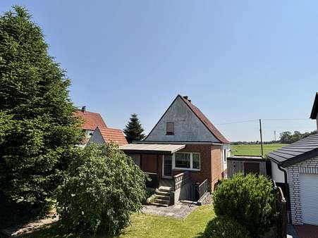 Außen 3 - Einfamilienhaus in 32584 Löhne mit 130m² kaufen