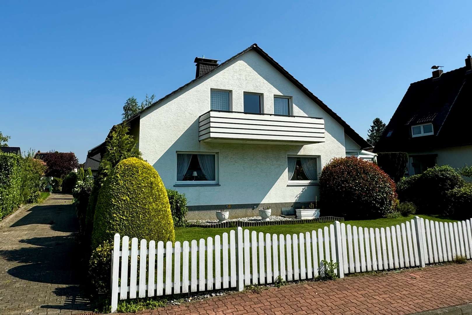 Straßenblick - Einfamilienhaus in 32584 Löhne mit 142m² kaufen