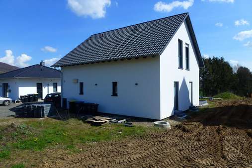 Straßenansicht - Einfamilienhaus in 32609 Hüllhorst mit 123m² kaufen