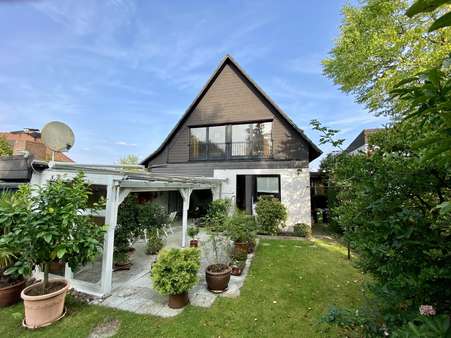 Rückansicht - Einfamilienhaus in 32584 Löhne mit 140m² kaufen