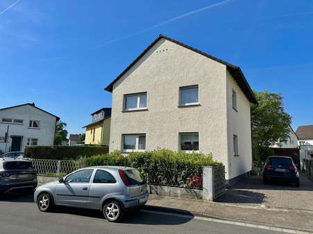 Vorderansicht - Einfamilienhaus in 63179 Obertshausen mit 116m² kaufen