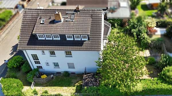 Seitenansicht Seitenansicht - Mehrfamilienhaus in 63456 Hanau mit 161m² kaufen