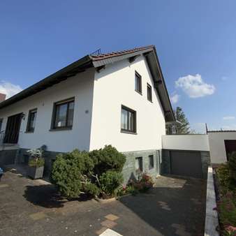 Seitenansicht - Einfamilienhaus in 63549 Ronneburg mit 115m² kaufen