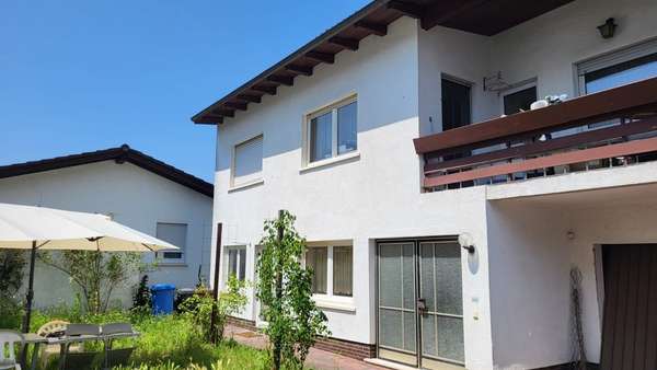 Ansicht - Einfamilienhaus in 63517 Rodenbach mit 98m² kaufen