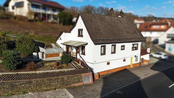 Außenansicht Außenansicht - Einfamilienhaus in 64760 Oberzent mit 153m² kaufen