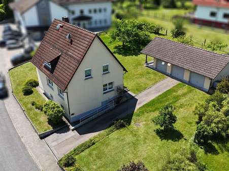 Titelbild - Einfamilienhaus in 64760 Oberzent mit 123m² kaufen