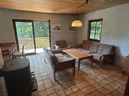 Wohnbereich mit Kamin im EG Wohnbereich mit Kamin im EG - Einfamilienhaus in 64760 Oberzent mit 88m² kaufen