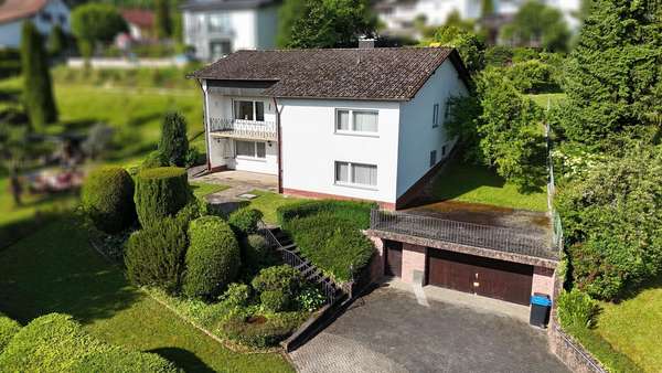Titelbild Titelbild - Einfamilienhaus in 64711 Erbach mit 155m² kaufen