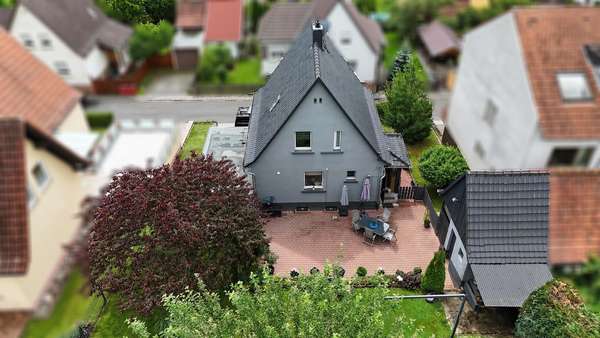 Gartenansicht Gartenansicht - Einfamilienhaus in 64711 Erbach mit 82m² kaufen