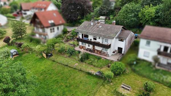 Titelbild - Einfamilienhaus in 64760 Oberzent mit 149m² kaufen